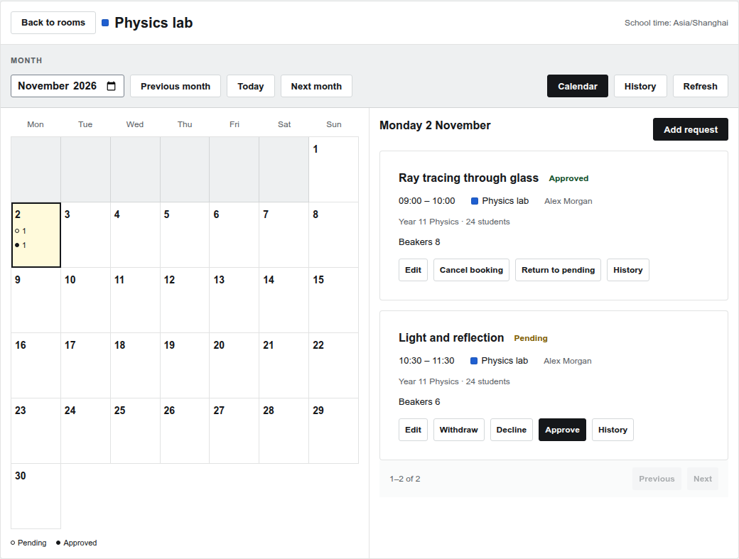 A school room calendar with separate pending and approved counts and the selected day's exact booking times.
